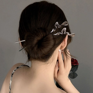 Modern silver butterfly hair pin with rhinestone butterfly in minimalist wave style
