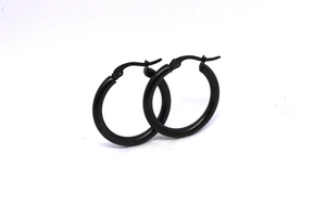 Detail view of 3mm thick black stainless steel hoop earrings with snap-post closure
