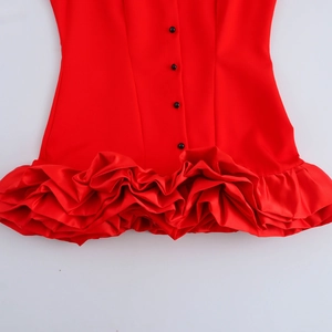 Sleeveless red layered ruffle mini dress with black buttons on a white background