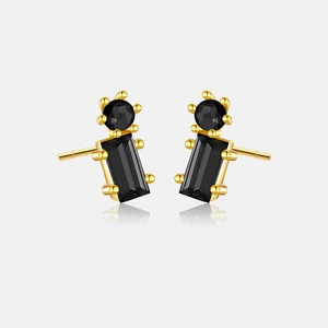 Close-up of S925 silver stud earrings with black stones and gold-plated finish