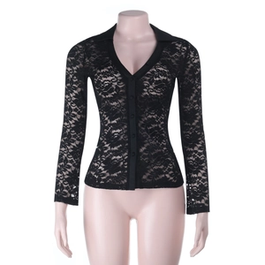 Close-up of black floral lace fabric with semi-transparent texture and polo collar detail
