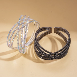 Three-layer geometric cross cuff bracelet with inlaid rhinestones in silver and black gunmetal