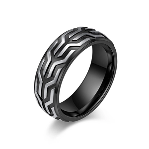 Men's retro tire tread ring in black and silver stainless steel shown from a side angle