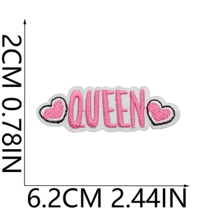 Close-up showing dimensions of pink Queen letter heart embroidery iron-on patch