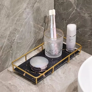 Bandeja de tocador de lujo en mármol negro con marco dorado para el baño y cosméticos