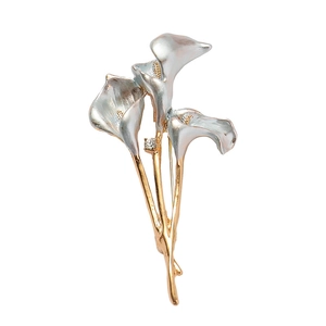 Enamel Calla Lily brooch in silver and gold alloy with sparkling diamond accents