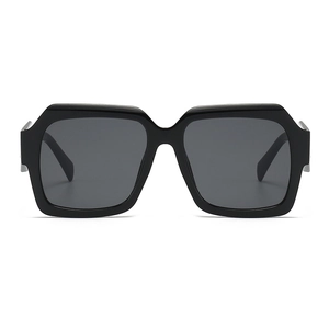 Fashionable oversized square polygon sunglasses in glossy black frame with dark grey lenses