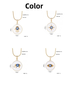 Detail of four golden Evil Eye pendants featuring Hamsa and Elephant on snake chains