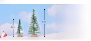 Miniature PVC Christmas trees with snow effect on wooden bases in 6cm and 9cm heights