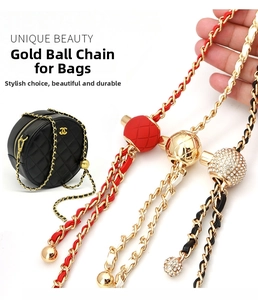 Macro detail of adjustable golden ball clasp on premium leather and metal bag chain