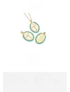 18K gold plated copper cross pendant with green crystals measuring 24x32mm and 5.3g weight
