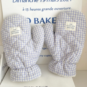 Pair of purple and white checkered quilted thermal gloves with fleece lining for winter