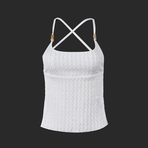 Detail of white slim-fit camisole with pleated fabric and amber bead strap accents