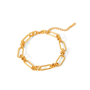 18K gold plated stainless steel wide chain bracelet with toggle clasp on white background