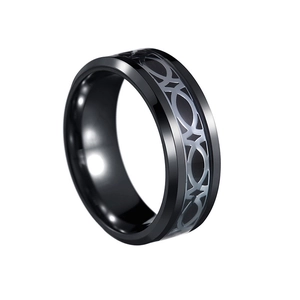 Detail shot of black titanium steel ring featuring silver Celtic knot patterns on 8mm band