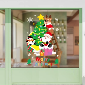 Christmas window stickers featuring Santa Claus, reindeer, and snowman with Merry Christmas text