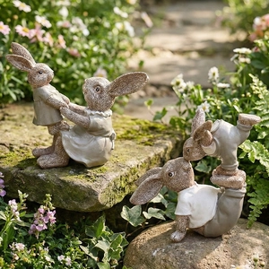 Resin rabbit garden statues featuring standing and handstand poses in a vintage stone finish