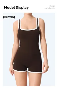 Close-up of brown ribbed yoga bodysuit with white contrast piping and racerback design