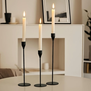 Set of 3 matte black metal candle holders in varied heights for modern home decor