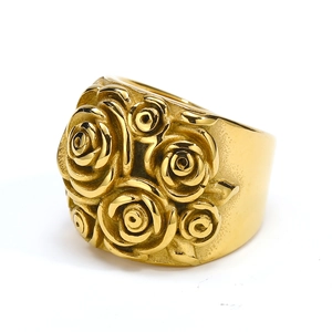 Macro detail of vintage gold floral ring featuring complex rose cluster design