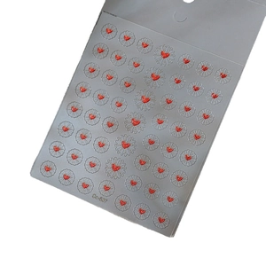 Self-adhesive red glitter heart nail art stickers with silver sunburst pattern, item Co-537