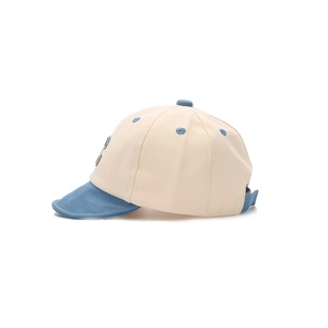 Two-tone cotton baby baseball cap in beige and blue featuring a side view embroidery