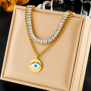Double-layered gold titanium steel necklace with tennis chain and evil eye pendant