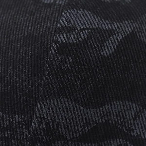 Macro shot of dark black camouflage jacquard fabric texture with vertical striped knit