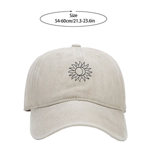 Close-up of sun and moon embroidery on washed cotton baseball cap with size details