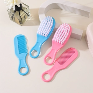 4-piece baby hair brush and comb set in blue and pink for gentle newborn scalp care