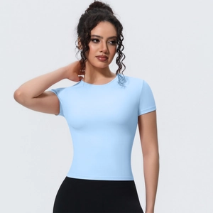 Close-up of slim fit light blue yoga tee featuring breathable fabric and crew neck design