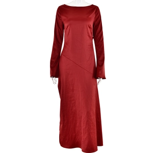 Detailed view of red long-sleeve satin dress showing glossy texture and slim fit design