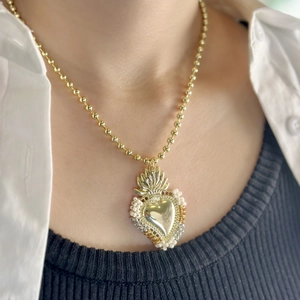 Retro gold sacred heart pendant necklace with handcrafted beads and a round ball chain