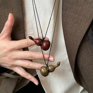 New Chinese style wooden gourd pendant necklace featuring natural wood grain and woven cord