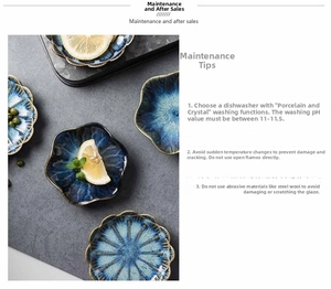 Detail of blue reactive glaze ceramic sauce dish with wavy petal edges and stone texture