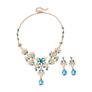 Vintage gold hollow flower necklace and earring set with blue teardrop zircon gems