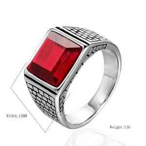 Men's vintage stainless steel ring with red gemstone and silver brushed texture