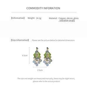Detailed size chart of bohemian tassel earrings measuring 6.5cm long and 2.5cm wide