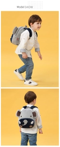 Detailed side and back view of a cute plush elephant backpack for toddlers on a model