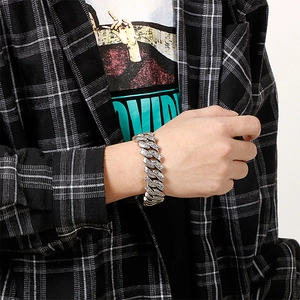 Close-up of vintage 304 stainless steel punk bracelet with floral flame pattern