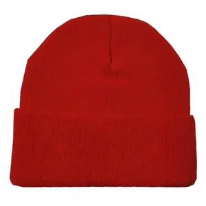 Detailed close-up of a red knitted beanie hat showing fine acrylic texture and cuffed design