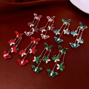 Elegant butterfly tassel drop earrings set with crystals in four vibrant colors