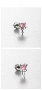 Detailed view of pink heart cartilage studs with wings and bow in titanium steel