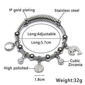 Bracelet œil turc doré avec pendentifs dauphin et zircons scintillants