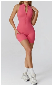 Detailed view of pink high-stretch yoga jumpsuit with front zipper and sleeveless fit
