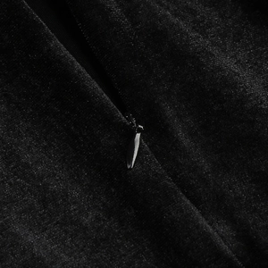Detail of invisible zipper stitching on black velvet fabric with high texture quality