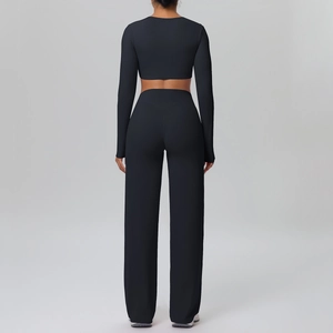 Detail of black long-sleeve crop top and high-waist wide-leg pants sports set back view