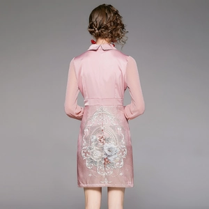 Elegant pink long-sleeve dress with floral embroidery on back and satin finish