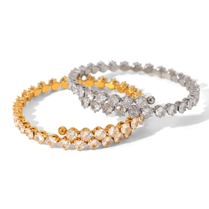 Bracelet jonc ouvert en acier inoxydable avec zircons brillants en finitions or et argent