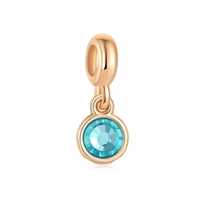 Elegant rose gold charm featuring a round light blue faceted crystal pendant for jewelry